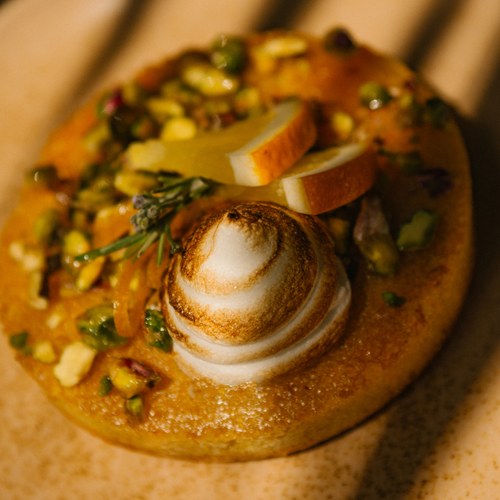 Aperol and semolina cake, meringue, pistachio