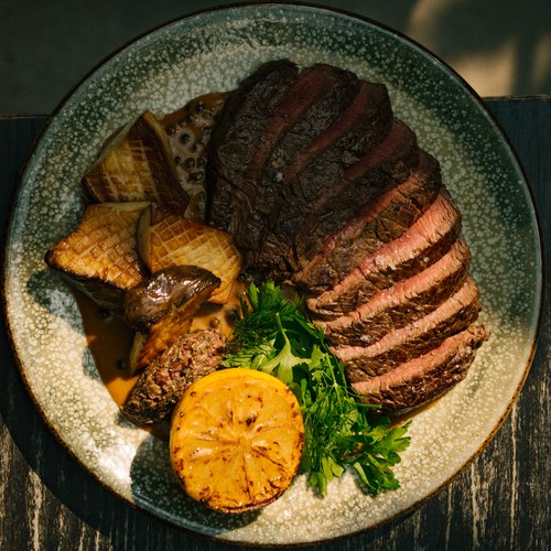 Wagyu rump beef steak, green peppercorn sauce, tapenade, king oyster mushroom